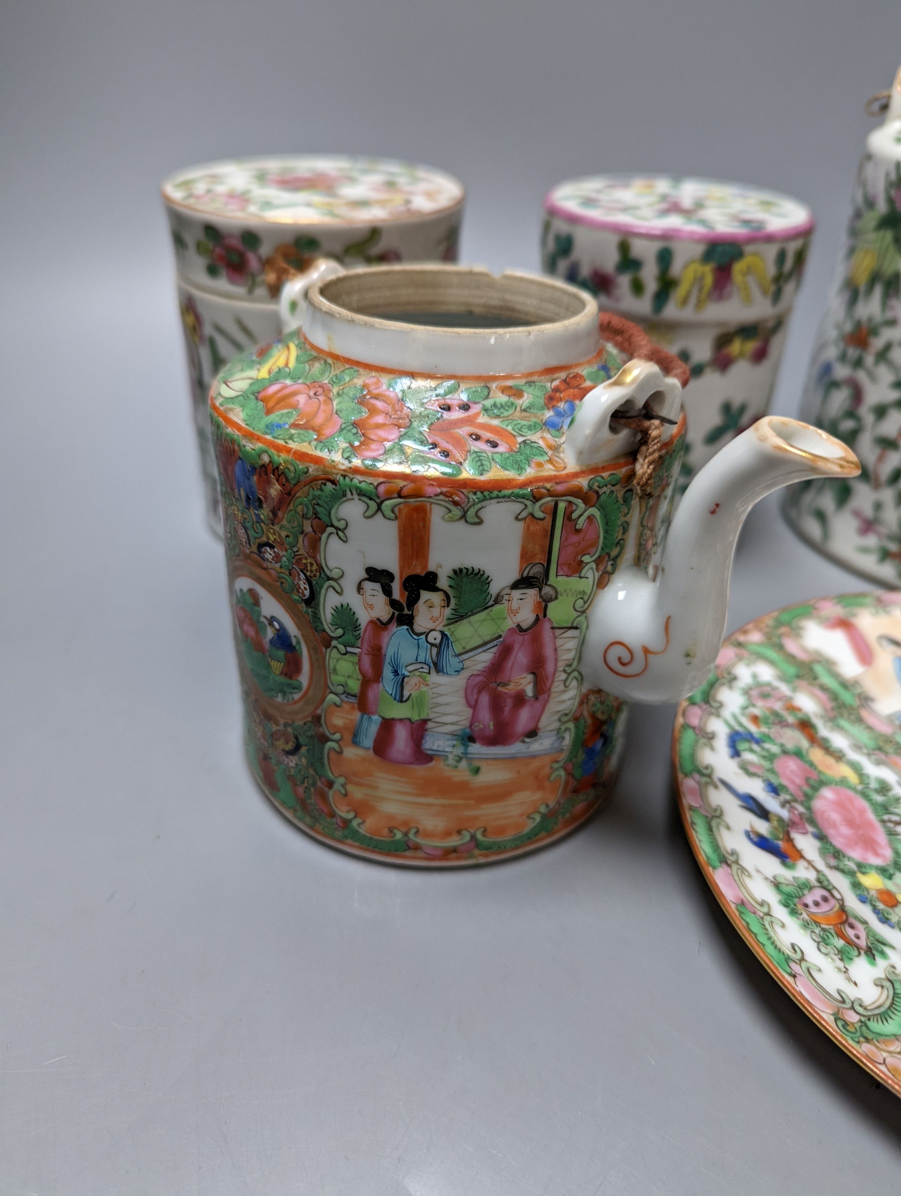 A group of 19th/20th century Chinese famille rose tea pots, plates, boxes and covers and a dish